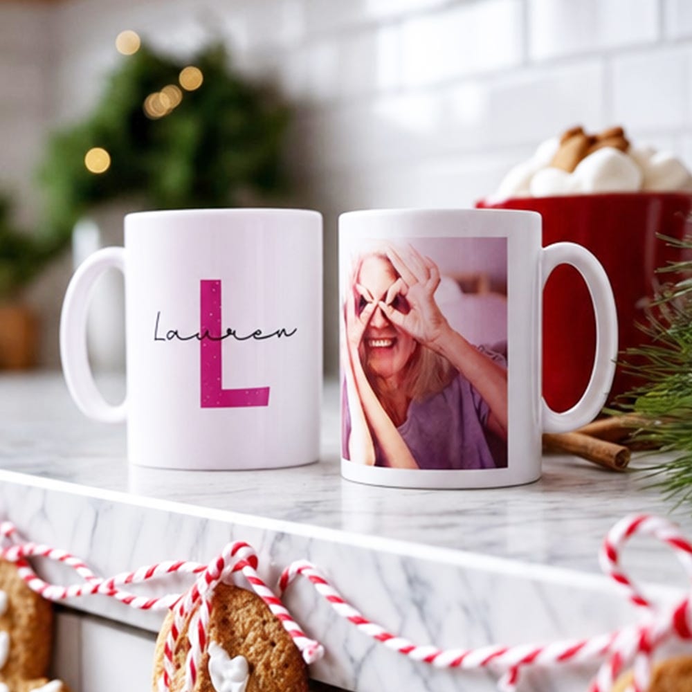 Two personalised mugs, one with a photo and one with a name and initial